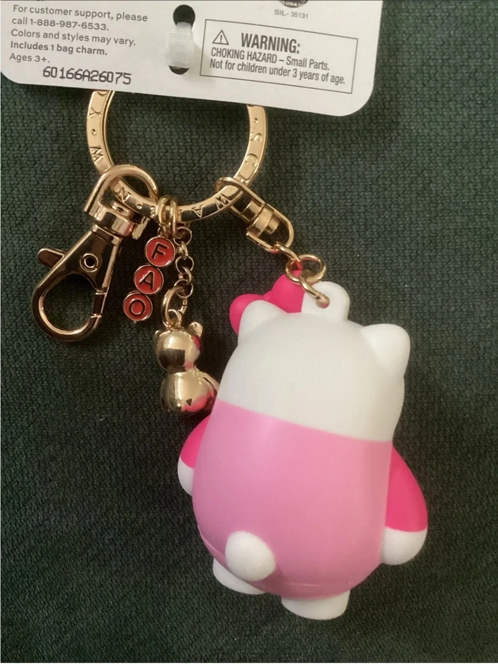 NWT FAO Schwarz Hello Kitty Pink and White Bag Charm Keychain